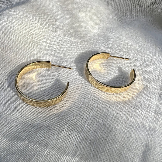 PENDIENTES MAYUR BAÑADOS EN ORO